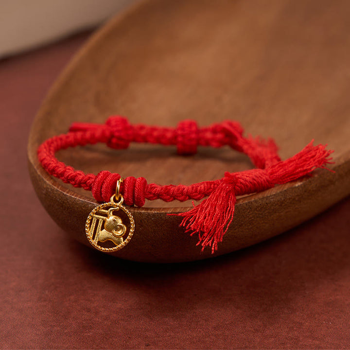 Buddha Stones 象の福の文字が金メッキされた銅製の赤紐のバランスチベットブレスレット - image 1