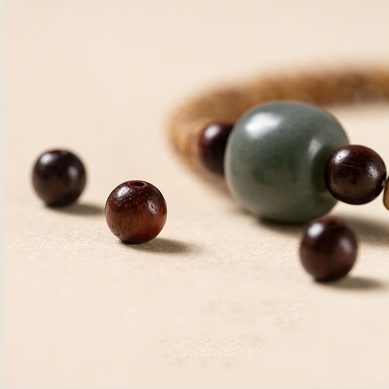 Buddha Stones菩提樹の小さな葉の紫檀の知恵のブレスレット