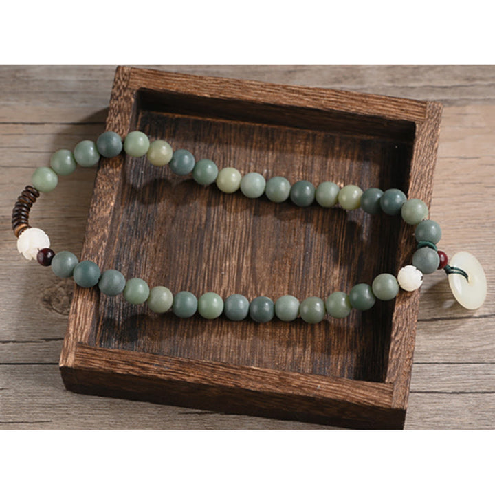 Buddha Stonesシアン菩提樹の種子 蓮の翡翠 平和バックル ウィズダム ダブルラップブレスレット