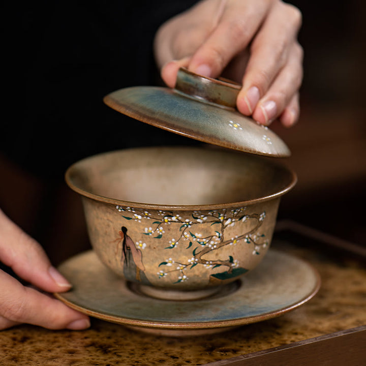 景徳鎮の手描きのルBuddha Stones磁器漢服少女の花の陶器蓋碗三彩ティーカップカンフーティーカップとソーサー蓋付き
