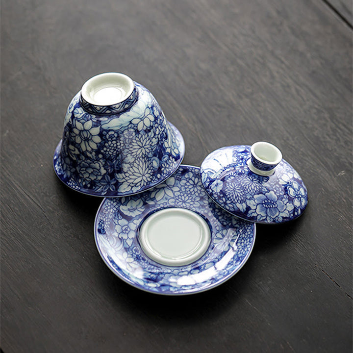 Buddha Stonesヴィンテージ青と白の磁器セラミック蓋湾三彩ティーカップカンフーティーカップとソーサー蓋付き