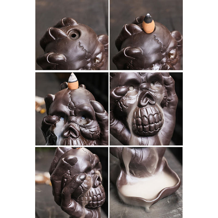 ハロウィンのBuddha Stonesとゴーストハンドの頭蓋骨、紫粘土のスピリチュアルな香炉の装飾