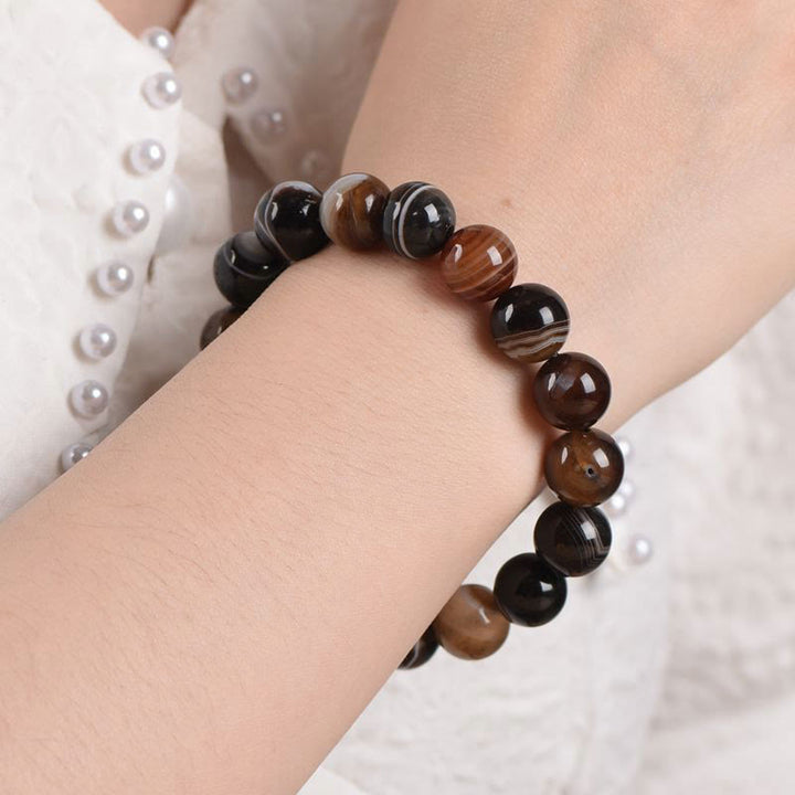 Buddha Stonesチベット産サードニクス 幸福のポジティブなブレスレット