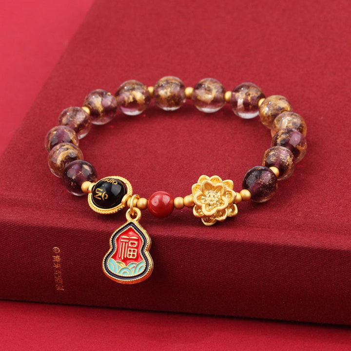 チベットのBuddha Stones、オーム・マニ・パドメ・フムフムフーのキャラクターひょうたんチャーム、蓮華座のガラスビーズ、幸運ブレスレット