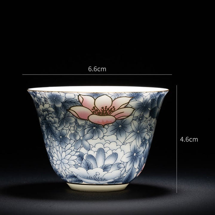 Buddha Stones、カラフルな花、蘭、海の波、青と白の磁器のティーカップ、カンフーティーカップ