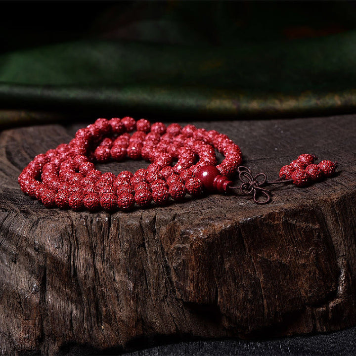 Buddha Stones 108Malaビーズ 辰砂Om Mani Padme Hum模様 刻印入り 祝福ブレスレット