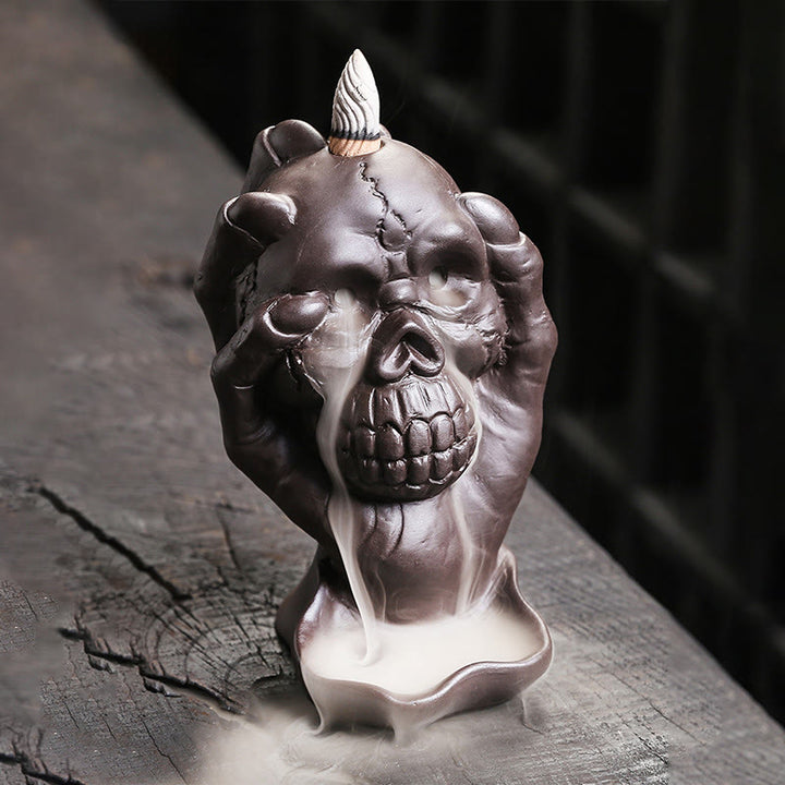 ハロウィンのBuddha Stonesとゴーストハンドの頭蓋骨、紫粘土のスピリチュアルな香炉の装飾