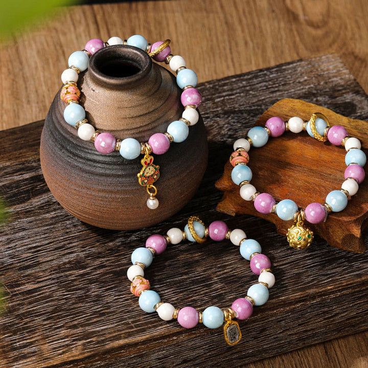Buddha Stonesチベットのザキラム女神 富の女神 ウサギ ライオンヘッドチャーム リュウリガラスインセンス 灰磁器ビーズ 保護ブレスレット