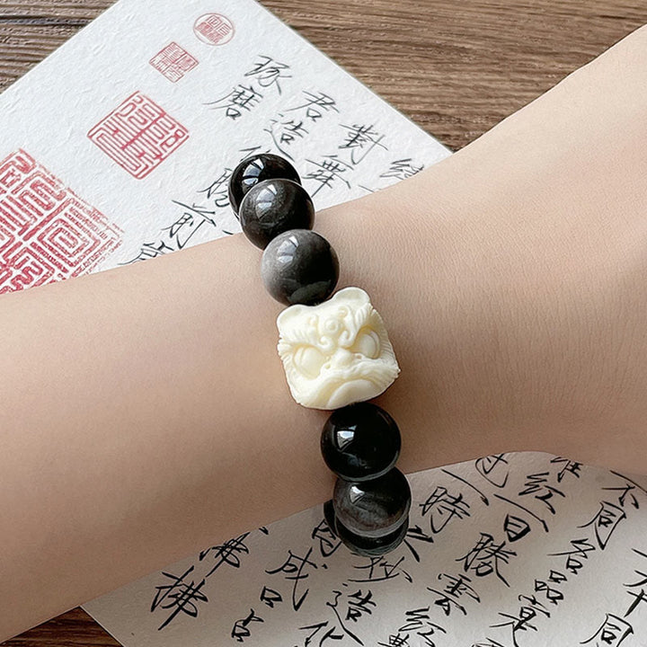 Buddha Stones銀の輝き 黒曜石 菩提樹の種 象牙 フルーツ ダンシングライオン 守護ブレスレット