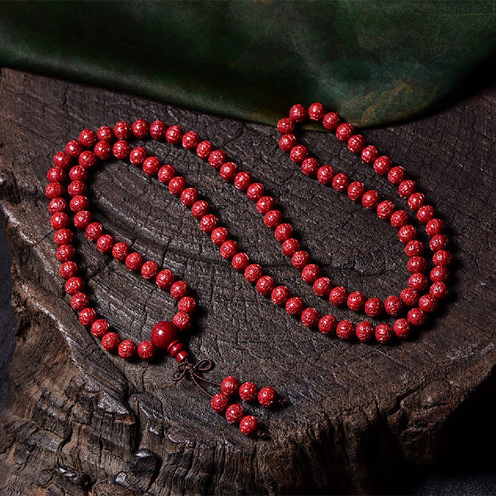 Buddha Stones 108Malaビーズ 辰砂Om Mani Padme Hum模様 刻印入り 祝福ブレスレット