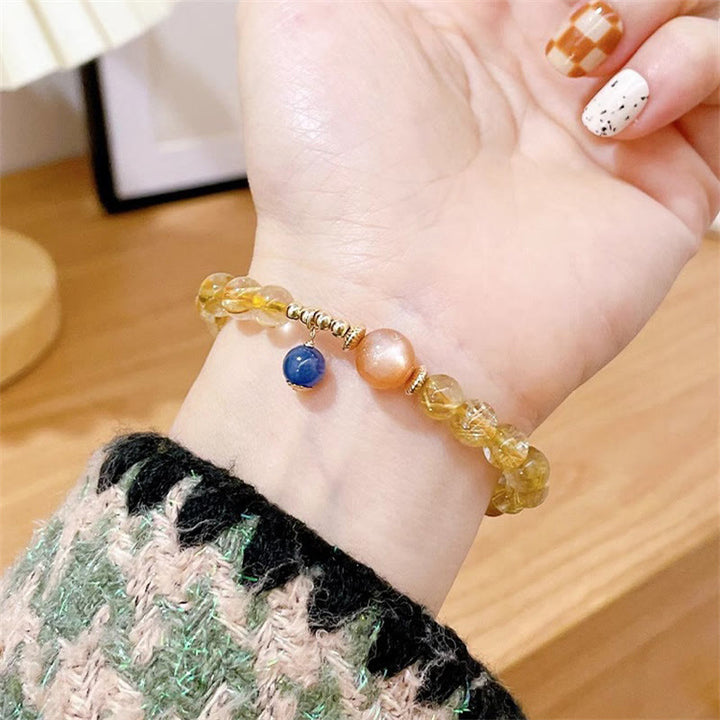 Buddha Stones天然ゴールドルチルクォーツ サンストーン カイヤナイト 富のブレスレット
