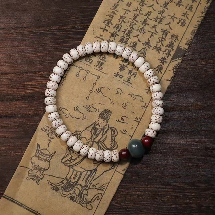 Buddha Stones菩提樹の小さな葉の紫檀の知恵のブレスレット