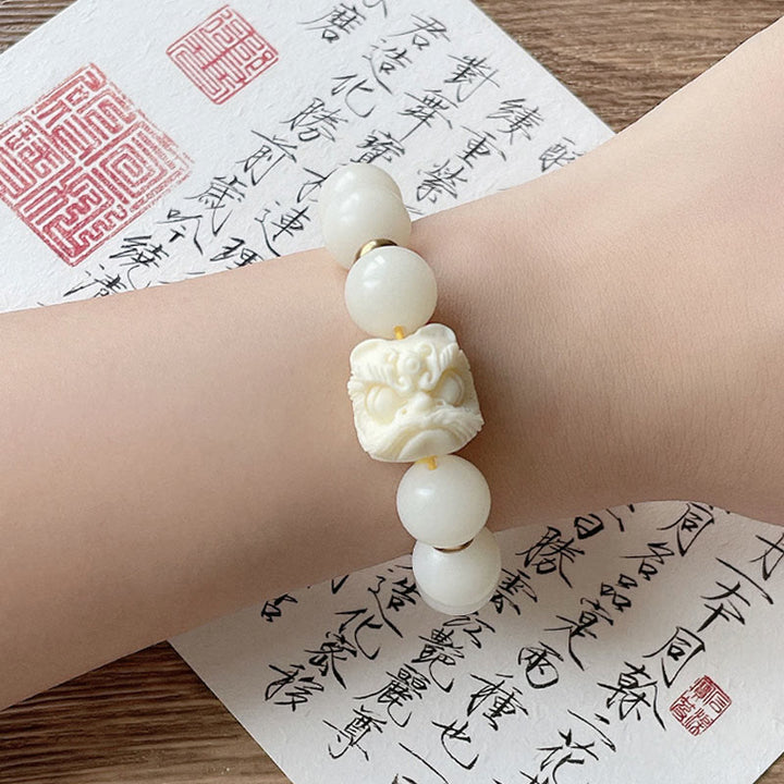 Buddha Stones銀の輝き 黒曜石 菩提樹の種 象牙 フルーツ ダンシングライオン 守護ブレスレット