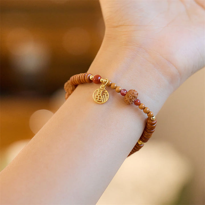 Buddha Stonesチベット菩提樹の種子 ブラックオニキス スモーキークォーツオーム・マニ・パドメ・フムフー キャラクター開運財運ブレスレット