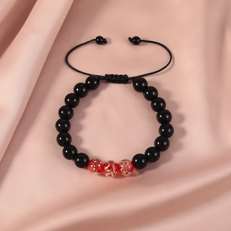 Buddha Stonesブラックオブシディアン 光るグロウストーン 強さのブレスレット