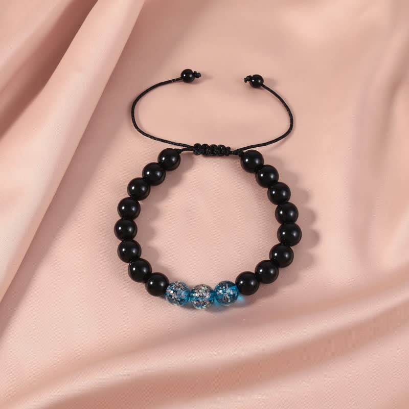Buddha Stonesブラックオブシディアン 光るグロウストーン 強さのブレスレット