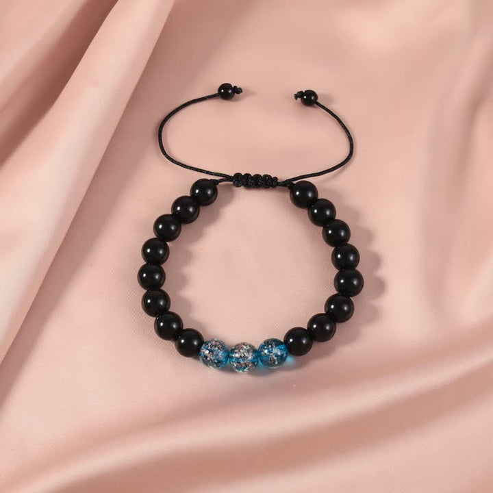 Buddha Stonesブラックオブシディアン 光るグロウストーン 強さのブレスレット