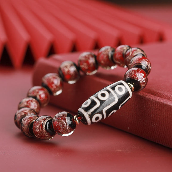 Buddha Stonesチベット九眼珠三眼珠琉璃ガラス玉富のブレスレット