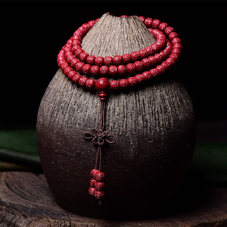 Buddha Stones 108Malaビーズ 辰砂Om Mani Padme Hum模様 刻印入り 祝福ブレスレット