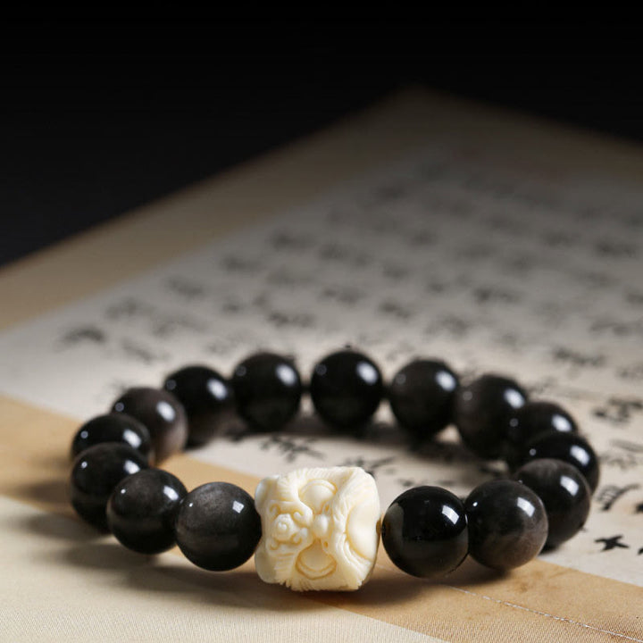 Buddha Stones銀の輝き 黒曜石 菩提樹の種 象牙 フルーツ ダンシングライオン 守護ブレスレット