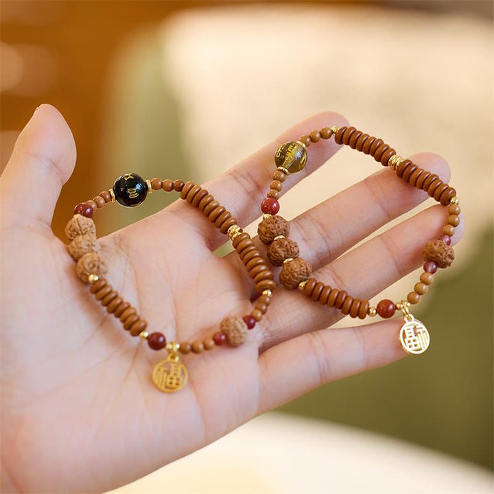 Buddha Stonesチベット菩提樹の種子 ブラックオニキス スモーキークォーツオーム・マニ・パドメ・フムフー キャラクター開運財運ブレスレット