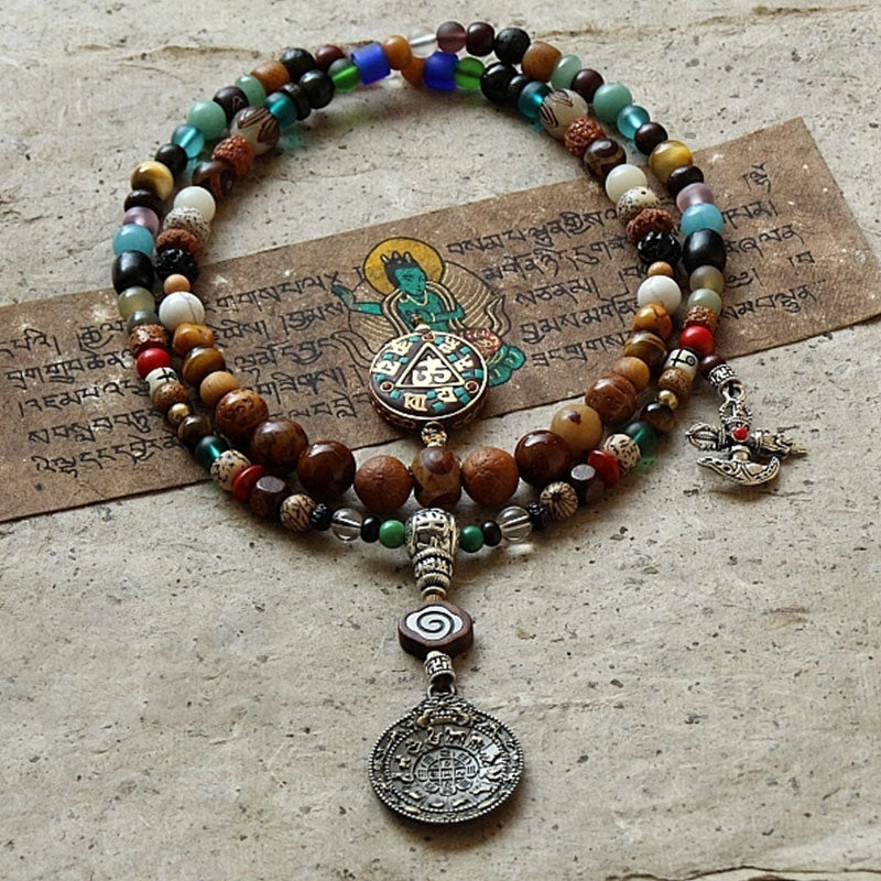 チベットのBuddha Stones108個のMala、九宮八卦菩提樹の実、ヤクの骨の金剛杵、調和のブレスレット