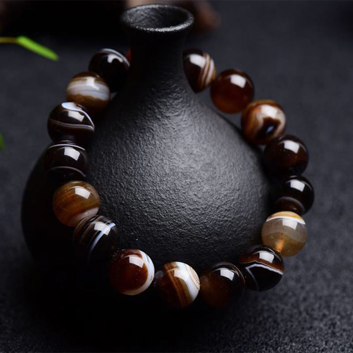Buddha Stonesチベット産サードニクス 幸福のポジティブなブレスレット