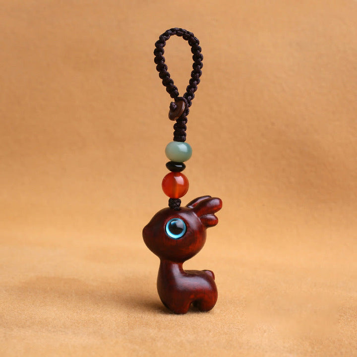 Buddha Stones白檀の小葉 紫檀 黒檀 緑檀 幸運のミニ鹿彫刻 守護キーチェーン 携帯電話吊り下げ装飾