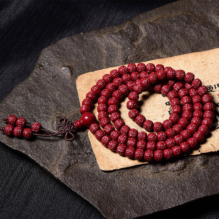 Buddha Stones 108Malaビーズ 辰砂Om Mani Padme Hum模様 刻印入り 祝福ブレスレット