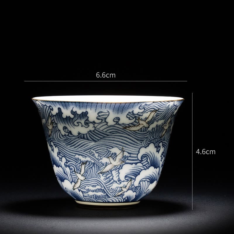 Buddha Stones、カラフルな花、蘭、海の波、青と白の磁器のティーカップ、カンフーティーカップ
