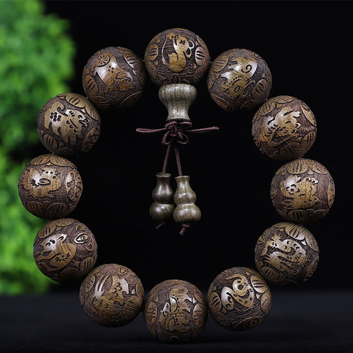 Buddha Stones、中国の十二支、ローズウッド、黒檀、銅貨、貔貅の彫刻、温もりのブレスレット