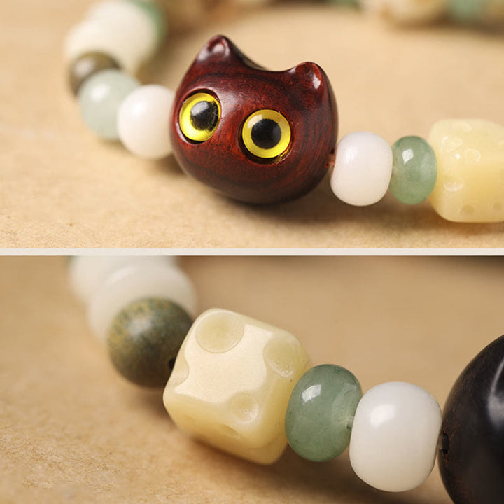 Buddha Stones菩提樹 緑白檀黒檀小葉紫檀猫の頭 足爪 平和ブレスレット - image 9