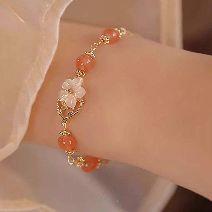 Buddha Stones赤瑪瑙 シャコガイ 石花 自信のブレスレット