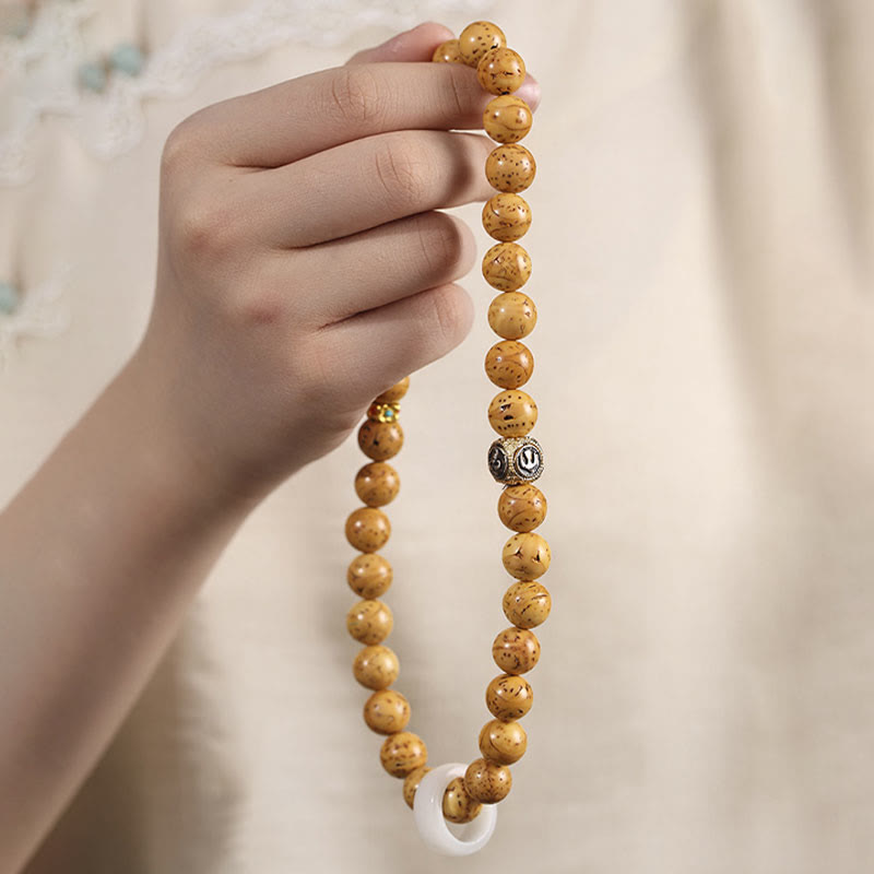 Buddha Stonesチベット天然紫金鼠菩提樹の富ダブルラップブレスレット