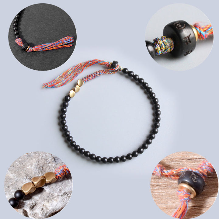 Buddha Stonesハンドメイドチベットブラックオニキスタッセルブレスレット
