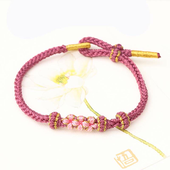 Buddha Stones手作りの三つの桃の花の幸運の8連編み紐ブレスレット
