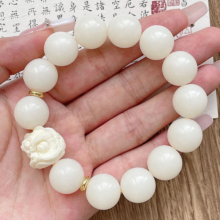 Buddha Stones銀の輝き 黒曜石 菩提樹の種 象牙 フルーツ ダンシングライオン 守護ブレスレット