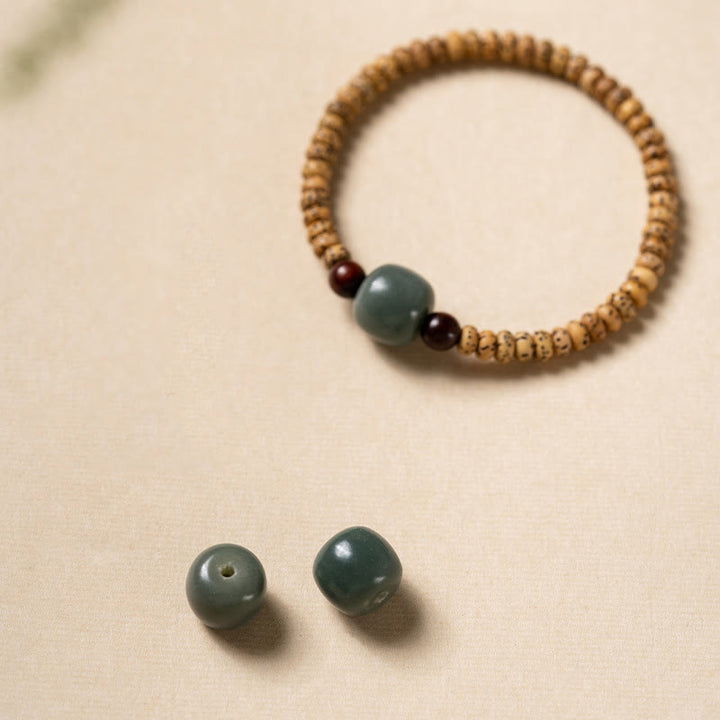 Buddha Stones菩提樹の小さな葉の紫檀の知恵のブレスレット