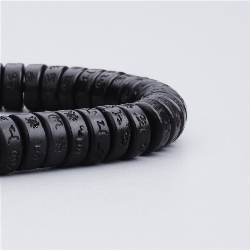 Buddha Stonesチベットココナッツシェルビーズ 彫刻入りオーム・マニ・パドメ・フムマントラ 幸福ブレスレット