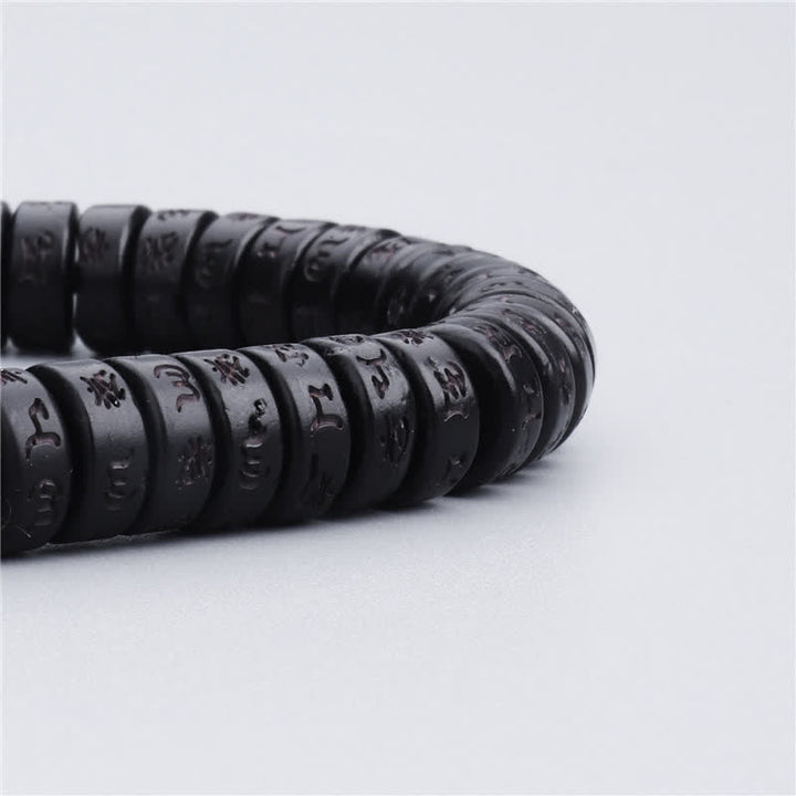 Buddha Stonesチベットココナッツシェルビーズ 彫刻入りオーム・マニ・パドメ・フムマントラ 幸福ブレスレット