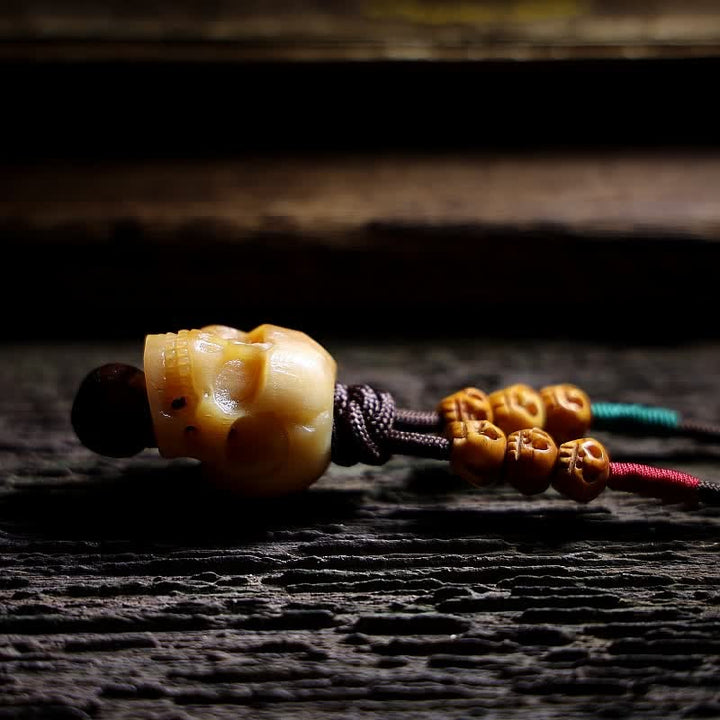 Buddha Stonesチベットラクダ骨の頭蓋骨 屍の王 森林保護のネックレスペンダント