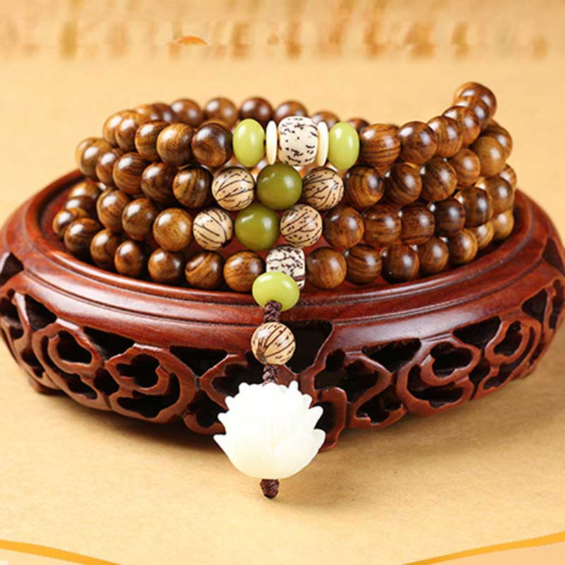 Buddha Stonesチベットローズウッド蓮のMala保護鎮静ネックレスブレスレット