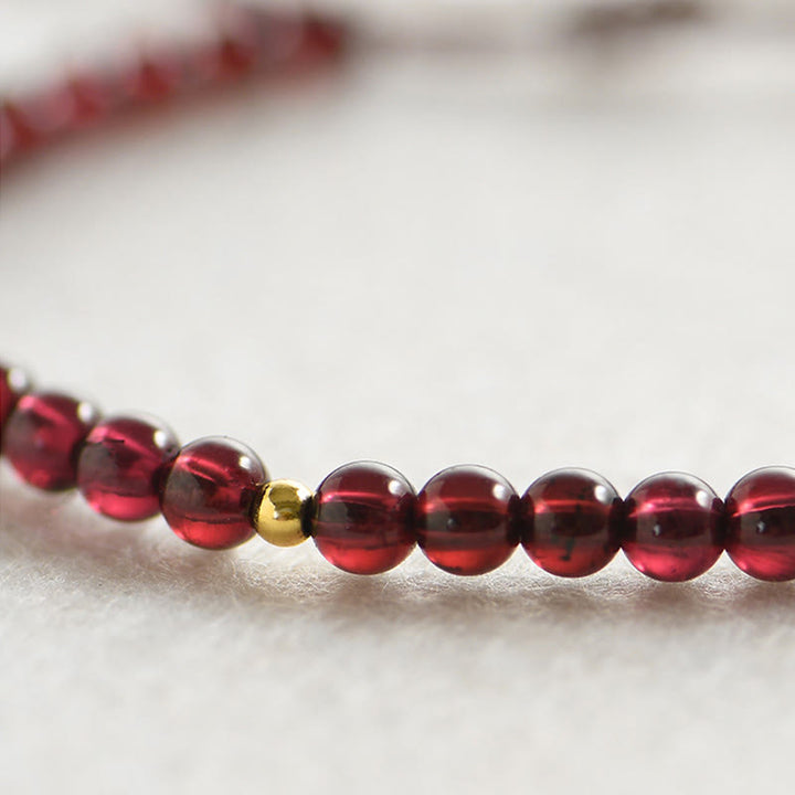 Buddha Stones天然ガーネットゴールデンビーズ安定ブレスレット