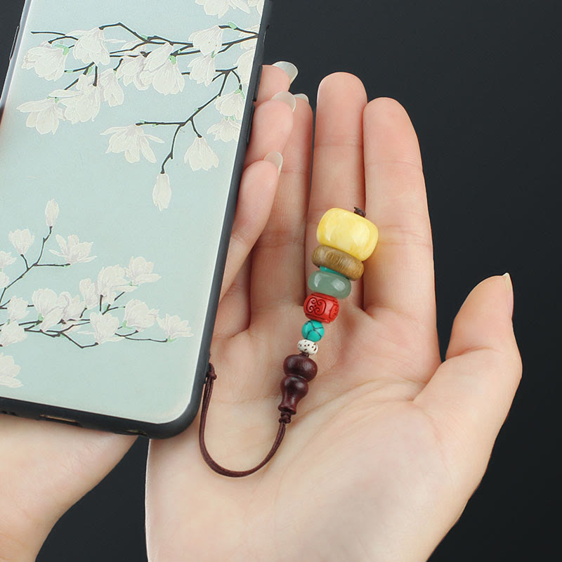 緑白檀と黒檀のひょうたんの七層塔の正の電話吊り飾り
