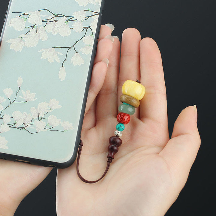 緑白檀と黒檀のひょうたんの七層塔の正の電話吊り飾り
