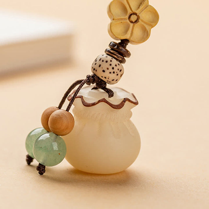 Buddha Stones天然菩提樹の種子 マネーバッグ 花の祝福 繁栄のキーホルダー