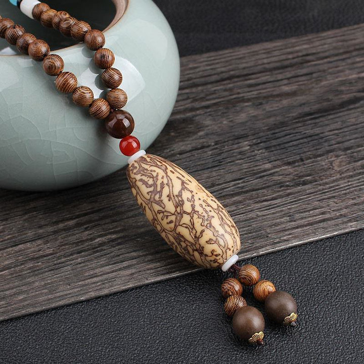 Buddha Stonesチベット ウェンジウッド 菩提樹 シードアゲート バランス ピース ネックレス ペンダント