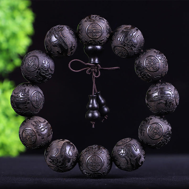 Buddha Stones、中国の十二支、ローズウッド、黒檀、銅貨、貔貅の彫刻、温もりのブレスレット