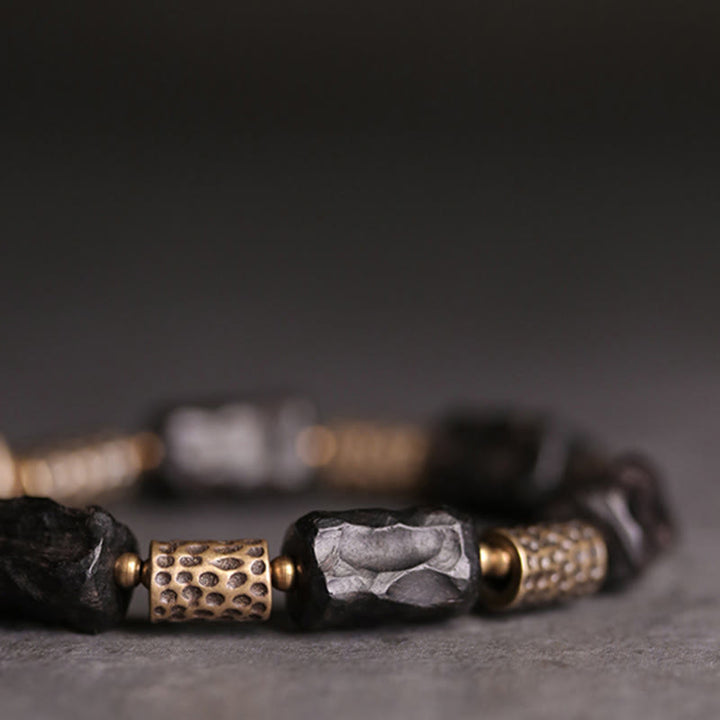 Buddha Stonesチベット黒檀 銅 穏やかで平和なブレスレット