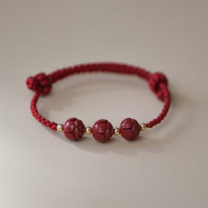 Buddha Stones辰砂 翡翠 蓮華 落ち着いた赤い糸織りブレスレット